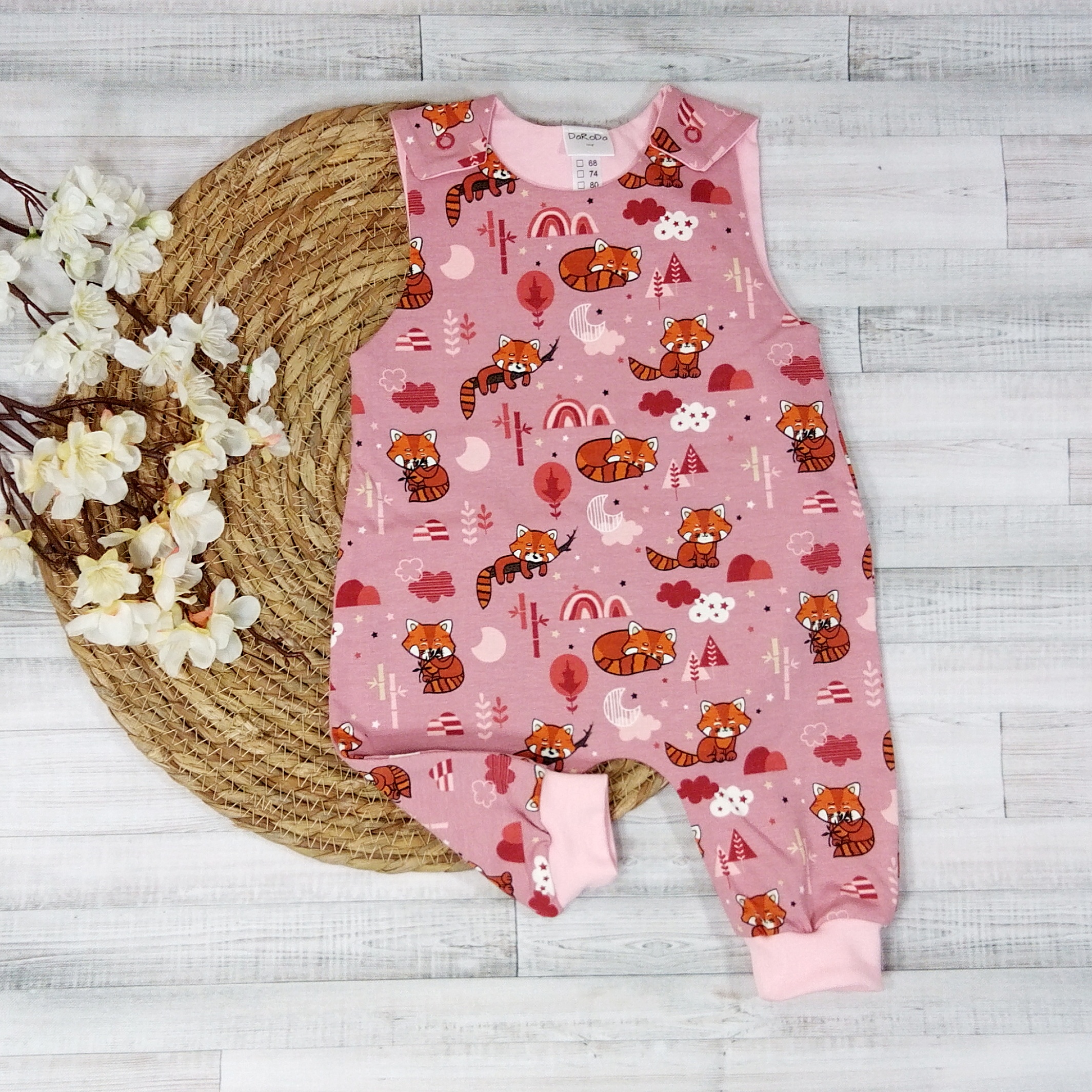 Strampler Waschbär Gr. 62